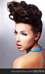 Glamour beautiful woman model with amazing makeup and romantic hairstyle. Fashion style