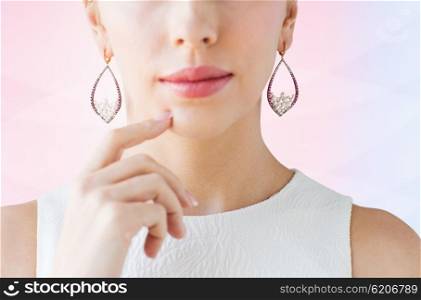 glamour, beauty, jewelry and luxury concept - close up of beautiful woman face with pearl earrings over rose quartz and serenity gradient background
