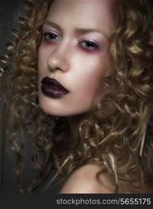 Glamour. Stylish Woman with Violet Mascara and Lips