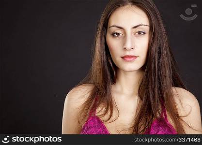 Glamour young girl face on dark background
