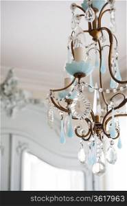 Glass and metalworked chandelier