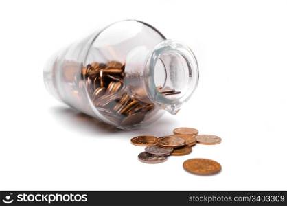 Glass bottle full of coins. Glass bottle full of coins on a white background
