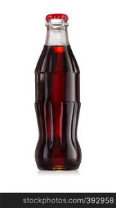 Glass bottle with a red cap and a carbonated beverage inside isolated on white background. Glass bottle with red cap and carbonated beverage inside