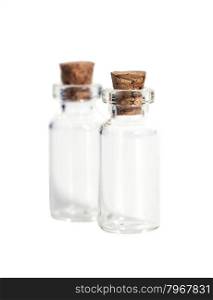 Glass bottles with cork cover isolated on white