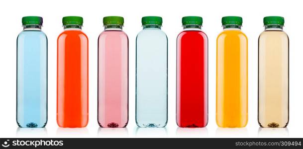 Glass bottles with fresh organic juice on white background