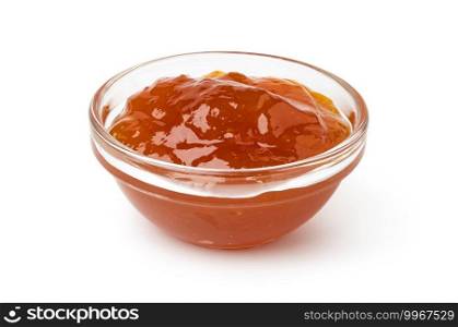 glass bowl of apricot jam isolated on white background. glass bowl of apricot jam