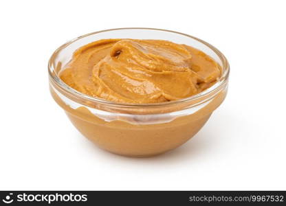 Glass bowl of peanut butter isolated on white background. Glass bowl of peanut butter