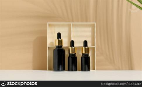 glass brown bottle with pipette a on light brown background. Mockup skincare cosmetic product