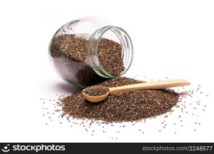 glass can full of organic natural chia seeds close-up isolated on white background. High quality studio photo. glass can full of organic natural chia seeds close-up isolated on white background