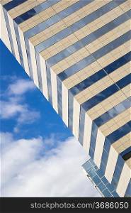 Glass, concrete and sky. Abstract building background. Photo.