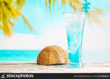 glass cooling blue drink inverted coconut shell