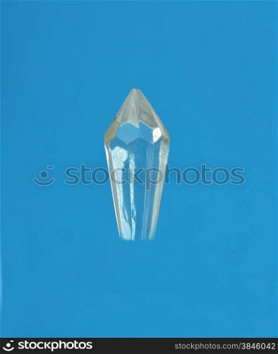 Glass crystal on blue