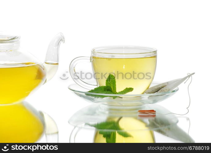 Glass cup of black tea. Isolated on white background