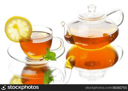 Glass cup of black tea. Isolated on white background
