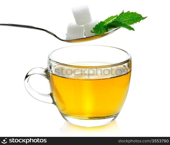 Glass Cup Of Green Tea With Sugar And Mint