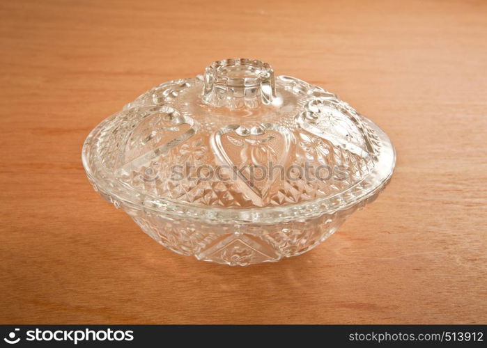 glass dish on the wood background