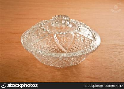 glass dish on the wood background