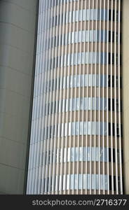 Glass facade of a modern office building. Architectural background.