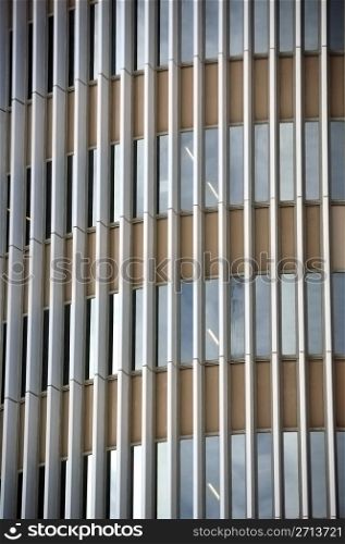 Glass facade of a modern office building. Architectural detail.