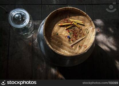Glass jar and woven baskets in thaihouses, thailand
