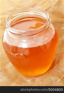 glass jar of fresh honey