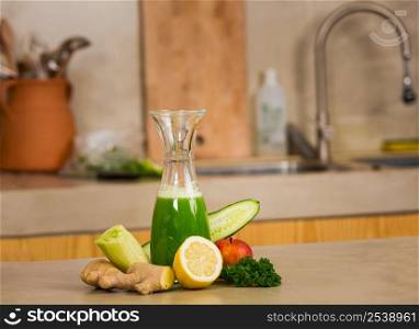 Glass jar of green juice, a detox beverage.