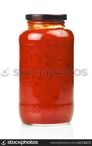 Glass jar of hot tomato sauce on a white background