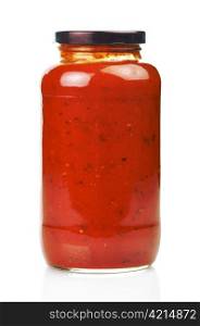 Glass jar of hot tomato sauce on a white background