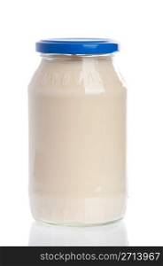 glass jar of mayonnaise blue cap isolated on white background