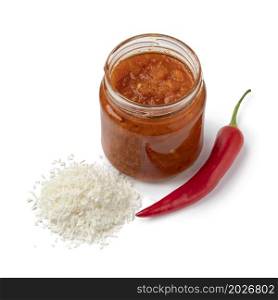 Glass jar with a variation of sambal, chili sauce, with soy sauce isolated on white background