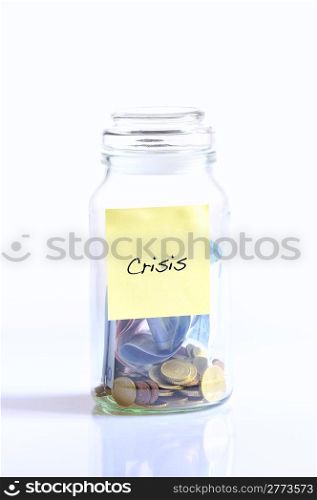 Glass jar with coins isolated for crisis.