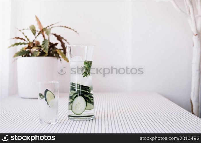 glass jug with refreshing water