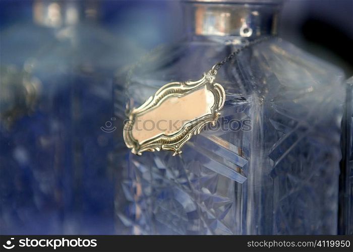 Glass liquor bottle with copy space metal