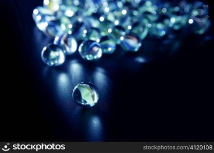 glass marbles with blue reflections
