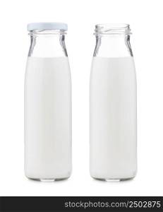 Glass milk bottle closed and open, isolated on white background