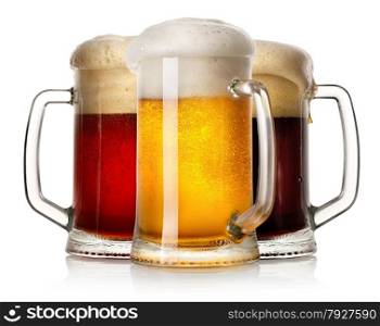Glass mugs of beer isolated on a white background