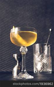 Glass of Alaska cocktail on the dark background