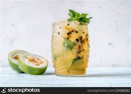 Glass of Bajan Mojito with fresh passion fruit