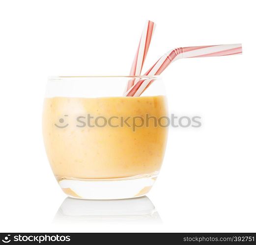 Glass of banana or vanilla smoothie or yogurt with straws isolated on white background. Glass of banana or vanilla smoothie or yogurt with straws