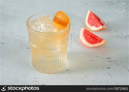 Glass of Banker&rsquo;s Lunch Cocktail garnished with grapefruit twist