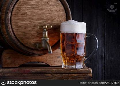 Glass of beer and v∫a≥wooden beer barrel still life