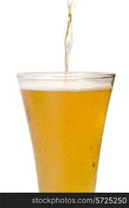 Glass of beer close-up with froth over white background