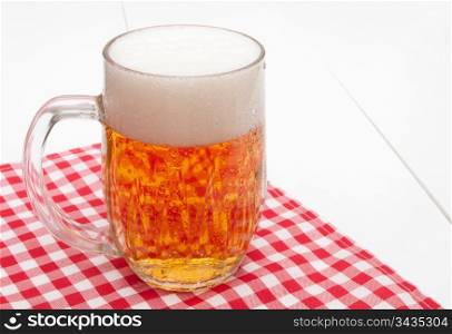 Glass of Beer on Red Gingham Tablecloth