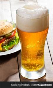 glass of beer with hamburger
