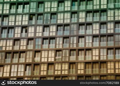 Glass of Business tall buildings vintage color for design background.