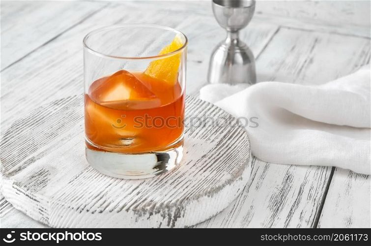 Glass of California Surfer Cocktail garnished with lemon zest