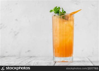 Glass of Carta Switchel cocktail garnished with fresh mint