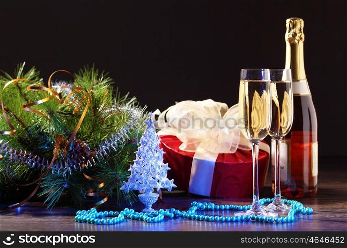 glass of champagne. glass of champagne and christmas decoration on the tavle for a new year eve