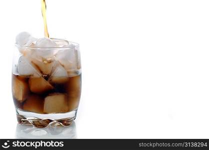 glass of cola and ice isolated on white with copy space