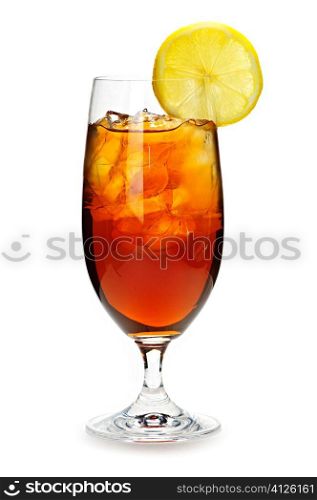 Glass of cold iced tea with ice and lemon